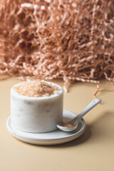 Bath sea salt into the white jar. Home spa cocnept.