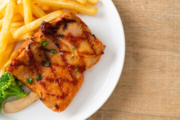 grilled chicken steak with potato chips or french fries