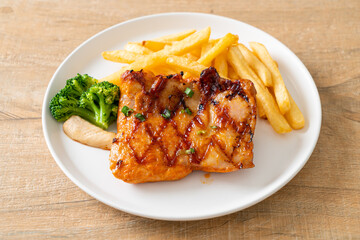 grilled chicken steak with potato chips or french fries