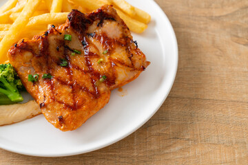 grilled chicken steak with potato chips or french fries