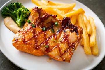 grilled chicken steak with potato chips or french fries
