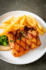 grilled chicken steak with potato chips or french fries