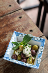 marinated spanish olives and feta cheese tapas in barcelona restaurant