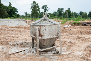 Cement tank made of steel is placed on the ground.