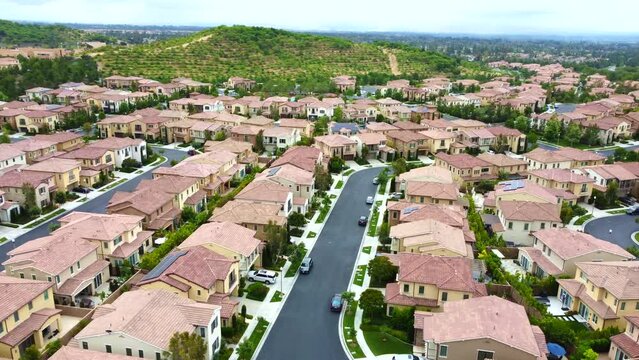 Aerial View of Affluent Residential Community in Irvine City, Orange County. CA USA. Upscale Homes in Rich Neighborhood, Drone Shot