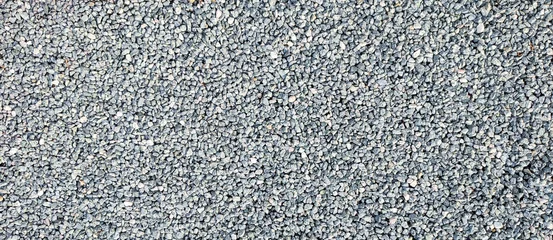 Fotobehang texture of gravel stones on ground background   © agrus