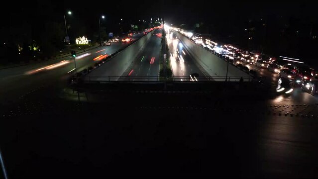 Beautiful Slow shutter timelapse of the big busy road on Light festival at night in Islamabad Pakistan