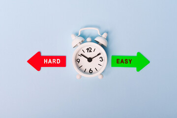 hard vs easy. Red arrow and green arrow- direction indicator - choice of hard or easy. Concept of...