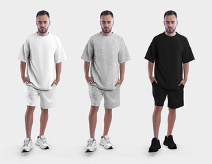 Mockup of white, black, heather oversized suit, t-shirt, shorts on brutal man in sneakers with...