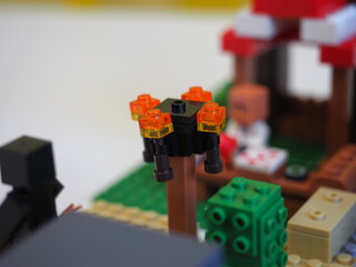 Fototapeta premium Elements and fragments of Lego village world set. Characters of electronic game Minecraft. Children's designer with small details, developing motor skills and imagination.