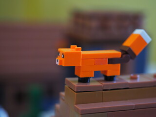 Fototapeta premium Elements and fragments of Lego village world set. Characters of electronic game Minecraft. Children's designer with small details, developing motor skills and imagination.