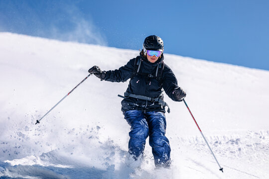 Woman sking on snowy slope