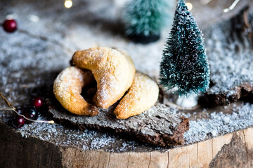 Studio shot of vanilla cookies and Christmas decorations