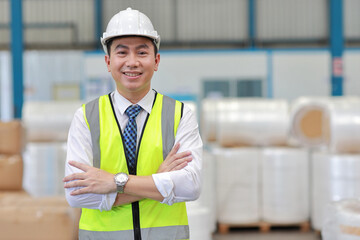 Asian engineering worker man portrait standing and arm crossed with happy smiling face with...