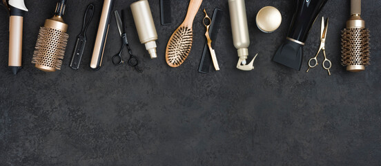 Various hair dresser tools on dark background with text space - obrazy, fototapety, plakaty