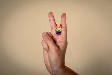 Fototapeta na wymiar Hand with symbol of freedom. LGBT rights, tolerance and liberalism