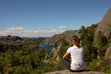 Naklejka na ściany i meble Happy people, enjoying amazing views in South Norway coastline, fjords, lakes, beautiful nature