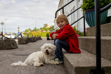 Beautiful town Kristiansand in Norway, family visiting Norway for summer vacation