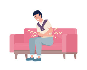 Man suffering from stomach ache on sofa semi flat color vector character. Editable figure. Full body person on white. Health simple cartoon style illustration for web graphic design and animation