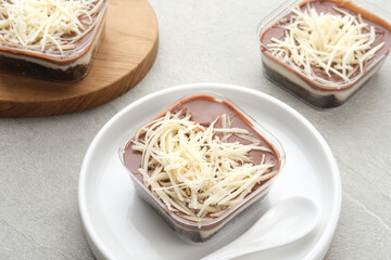 Chocolate dessert box, with cheese topping, creamy and delicious. 
