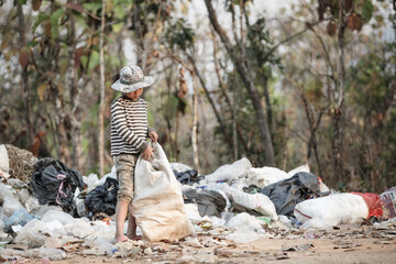 Child labor. Children are forced to work on rubbish. Poor children collect garbage. Poverty, Violence children and trafficking concept,Anti-child labor, Rights Day on December 10.