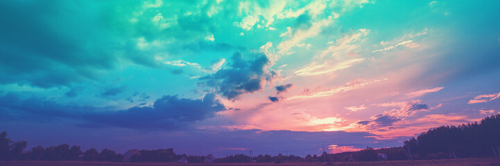 Rural landscape with beautiful gradient evening sky at sunset. Horizontal banner