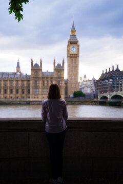 panoramic view of london with big ben.woman contemplating big ben.