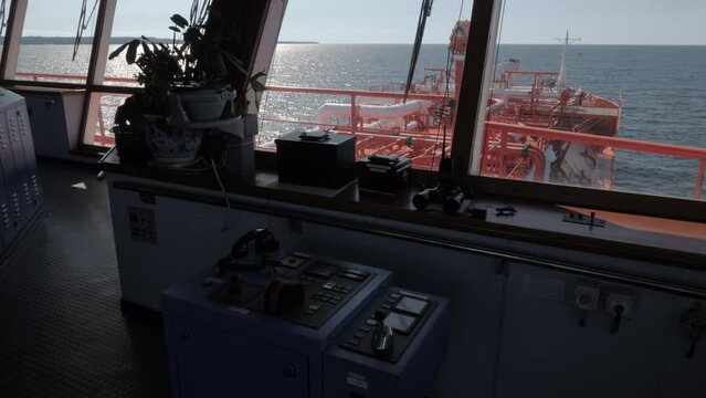 Navigation bridge of LNG tanker at sea