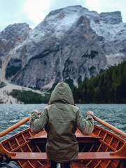 Rowing a boat at Lago di Braies, South Tyrol, Italy.