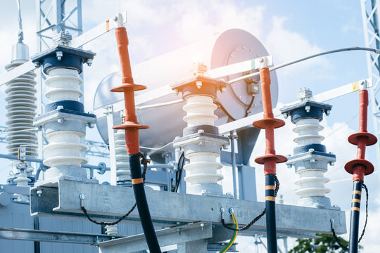 High voltage switchgear and equipment of power plant. View  of electric power transmission lines.