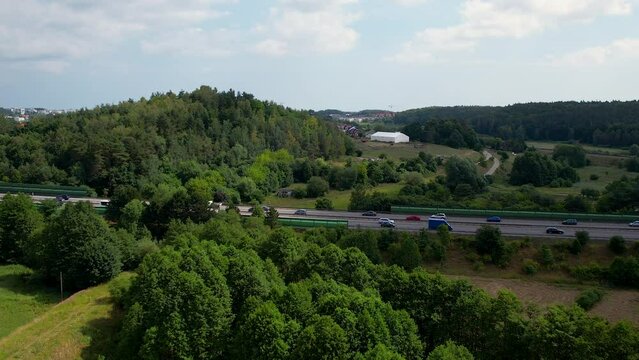 Busy Highway in Europe, aerial pedestal up with cars on the road