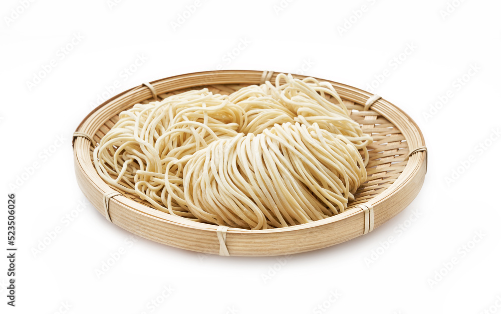 Wall mural raw ramen noodle in wood plate isolated on white background. fresh egg ramen noodles isolated on whi