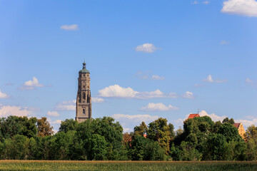 the steeple of the Evangelical Lutheran parish church in the center of the city of Noerdlingen is...