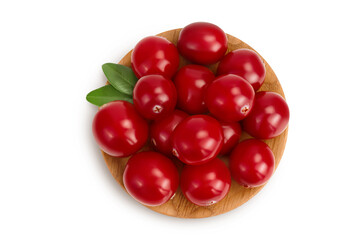 Cranberry in wooden bowl isolated on white background with full depth of field. Top view. Flat lay