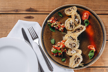 There are a delicious dish on the wooden table in the restaurant.