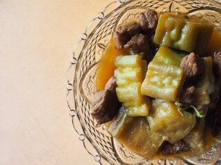 bitter gourd with pork stew in glass bowl