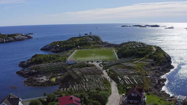 Drone Flying Towards Henningsvaer Football Stadium In The Village Of Lofoten Islands Off The Coast Of Northern Norway. aerial