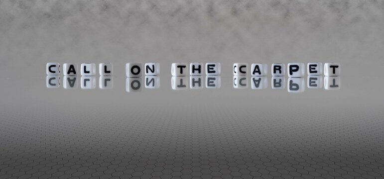 call on the carpet word or concept represented by black and white letter cubes on a grey horizon background stretching to infinity