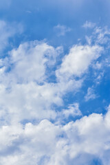Naklejka na ściany i meble Fluffy and light clouds on the blue sky