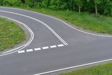 Asphalt road. Roadway with markings.