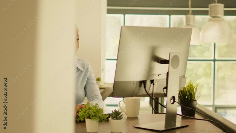 Poster african american woman doing executive work on computer during sunset hour. working on business pres