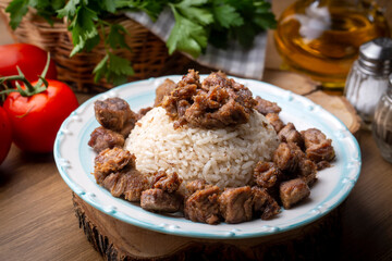 Fototapeta na wymiar Turkish Meat Et Kavurma with rice - pilav (Turkish name; kurban kavurma, pilav ustu kavurma)