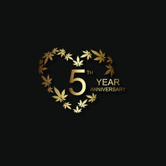 5th anniversary logo in gold color with marijuana leaves  isolated on black background, vector design for greeting card and invitation card.