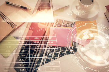 Multi exposure of financial chart drawing over table background with computer. Concept of research and analysis. Top view.