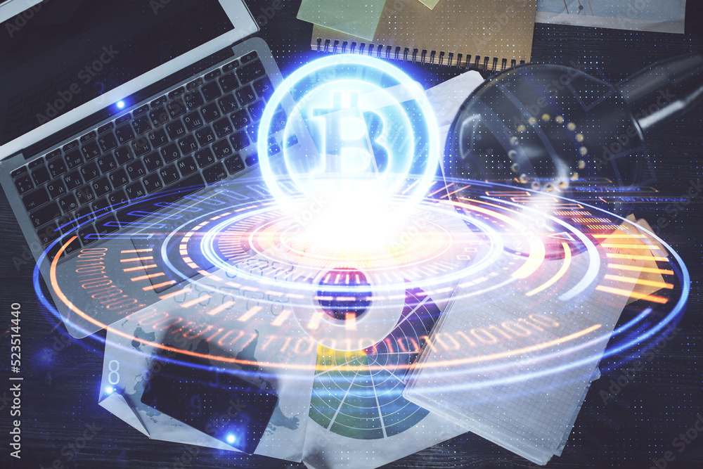 Poster Blockchain theme hologram drawings over computer on the desktop background. Top view. Double exposure.