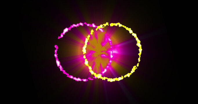 Image of glowing yellow and pink circles over black background