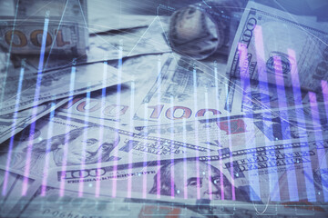 Multi exposure of forex chart drawing over us dollars bill background. Concept of financial success markets.