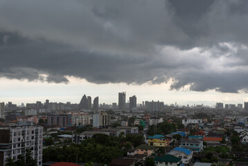 dark storm clouds over city
