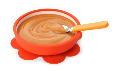 Bowl and spoon with tasty pureed baby food isolated on white