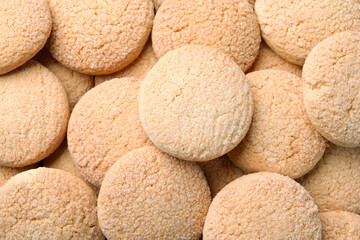 Fototapeta na wymiar Tasty sugar cookies as background, top view